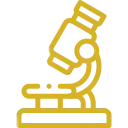 Icono dorado de un microscopio para investigación